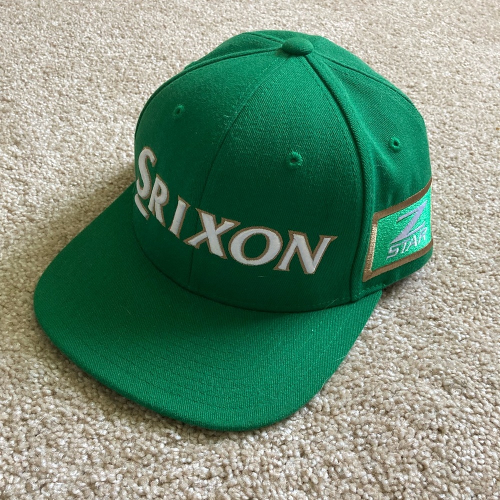 Srixon hat green with gold and white accents